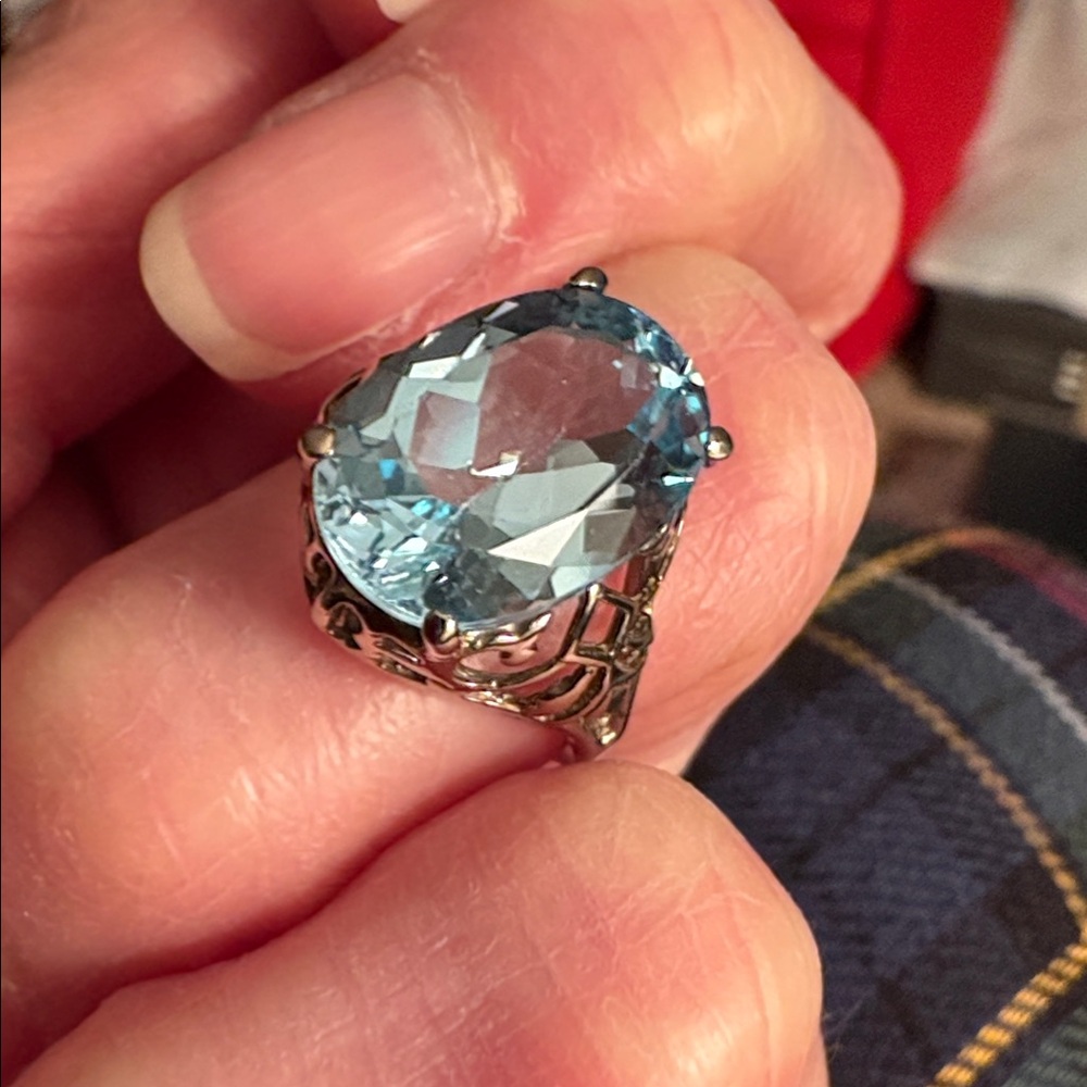 Large Blue Topaz ring in solid  10K white gold ring.